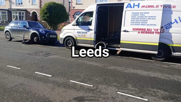 AH Mobile Tyre Fitting van beside a customer vehicle in Leeds